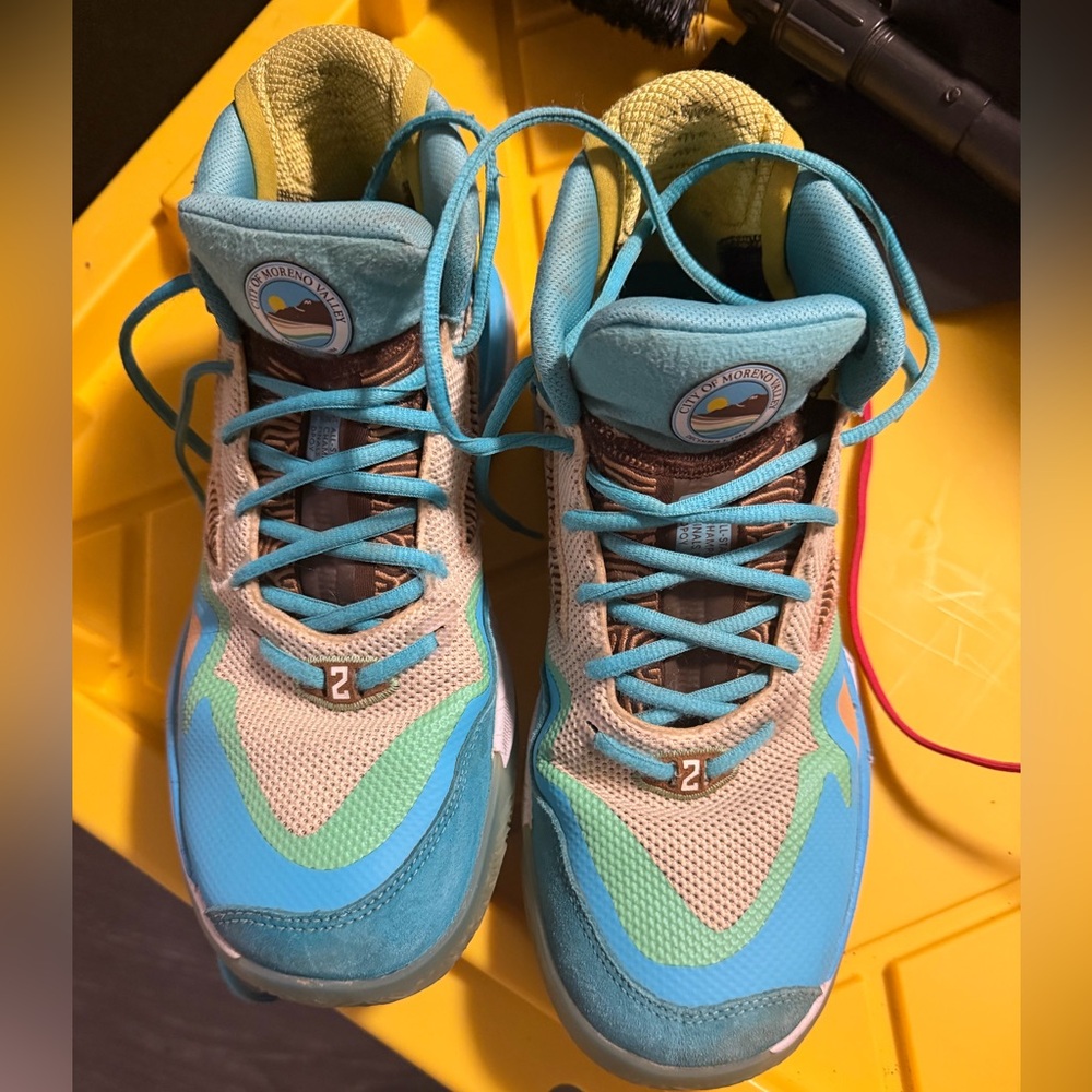 New Balance Kawhi Leonard Moreno Valley Turquoise and Yellow Athletic Shoes